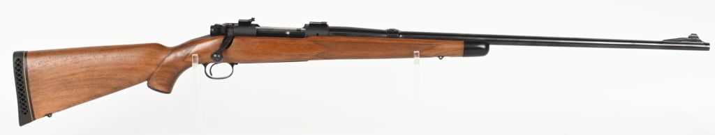 WINCHESTER MODEL 70 SUPER GRADE RIFLE IN .300 H&H: SERIAL NUMBER: 192522. BARREL: 26". CALIBER: .300 H&H MAGNUM. MANUFACTURED: 1951. "SUPER GRADE" marked on the bottom of the trigger guard. Barrel markings are typical for a Pre 64 Winchester Model 70.