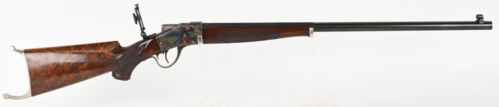RARE SHARPS-BORCHARDT 1878 WITH REMINGTON BARREL.: SERIAL NUMBER: 9677. BARREL: 27-1/2. CALIBER: 32-40 REM. MANUFACTURED:CIRCA 1880. Fine example of a Sharps-Borchardt Model 1878 refitted in the day with a Remington marked barrel. Barrel is blued and
