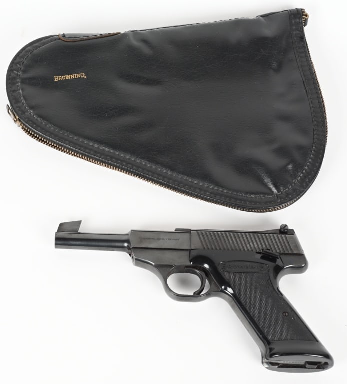 BROWNING NOMAD SEMI AUTO PISTOL WITH CASE: SERIAL NUMBER: 82151P7. BARREL: 4-1/2". CALIBER: .22LR. MANUFACTURED: 1967. Belgian made, with commercial proofs on the barrel, slide, and trigger guard. Factory large blade front sight and adjustable