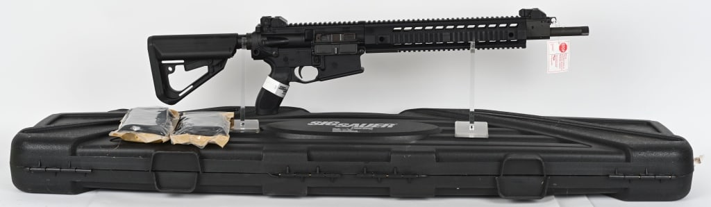 SIG SAUER SIG716 SEMI AUTO RIFLE WITH CASE: SERIAL NUMBER: 22C017340. BARREL: 18-1/2". CALIBER: 7.62X51 NATO. MANUFACTURED: 2010S. Factory barrel with a threaded muzzle and "1/10" twist rate. Piston driven gun, with a low profile gas block. Fac