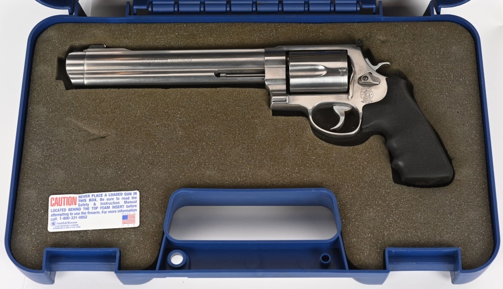 EARLY SMITH & WESSON MODEL 500 WITH CASE: SERIAL NUMBER: CJZ4813. BARREL: 8-1/4". CALIBER: .500 SMITH & WESSON MAG. MANUFACTURED: 2006. Standard markings and features, including a five shot fluted cylinder. Blade front sight and adjustable u-