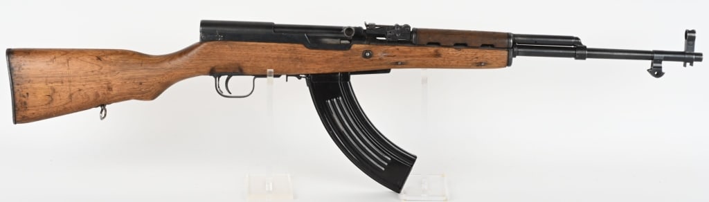 CHINESE NORINCO SKS SEMI AUTO RIFLE: SERIAL NUMBER: 12222819. BARREL: 20-1/2". CALIBER: 7.62X39. MANUFACTURED: 1980S. "triangle/26" arsenal mark on the left side of the receiver. Import marked on the barrel. Matching serials on the recei