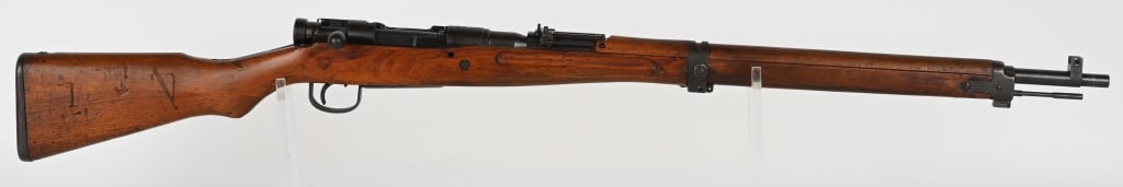 JAPANESE NAGOYA ARSENAL TYPE 99 ARISAKA RIFLE: SERIAL NUMBER: 92802. BARREL: 26". CALIBER: 7.7 JAPANESE. MANUFACTURED: 1940S. Series 4 rifle made at Nagoya Arsenal. Mum has an "X" through it. No import marks found. Matching serials on the receiver