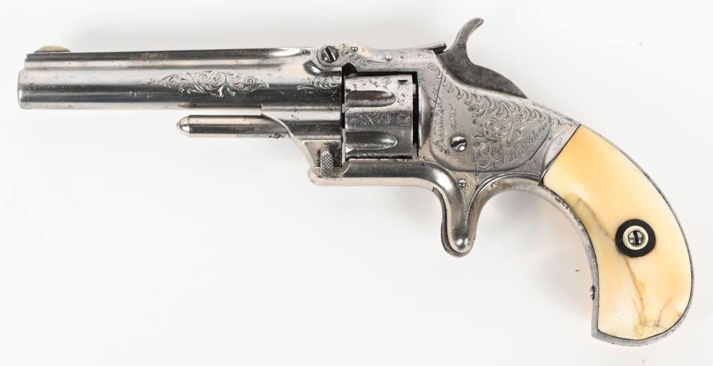 PRESENTATION ENGRAVED SMITH & WESSON NO 1 3RD ISSU: SERIAL 11381. BARREL 3". CALIBER .22 RF. MADE 1868-1881. Presented to J. McMAHEN by ST. PATRICKS PAROCHIAL TEMPERANCE SOCIETY with additional scroll engraving, nickel finish, genuine ivory bird head g