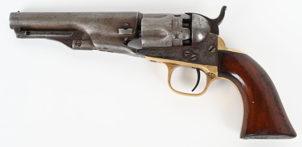 COLT 1862 POLICE PERCUSSION REVOLVER: SERIAL 21800. BARREL 4.5'. CALIBER 36. MADE 1863. Features round barrel, five shot fluted cylinder, brass straps, one piece varnished walnut grips, pat. stamp on cylinder flute, one line barrel addres