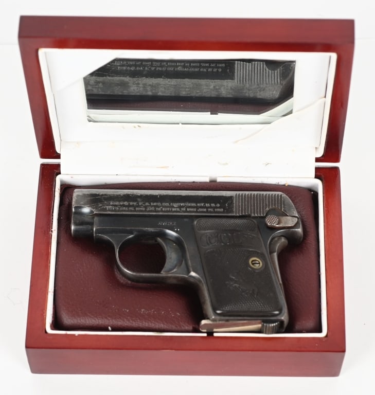 COLT MODEL 1908 POCKET .25 AUTO: SERIAL 2631. BARREL 2". CALIBER .25ACP. MADE 1909, 2ND YEAR. Standard Browning design pocket, blue finish, case color grip safety, trigger and slide lock. Magazine is nickel non Colt. Gutta percha gri