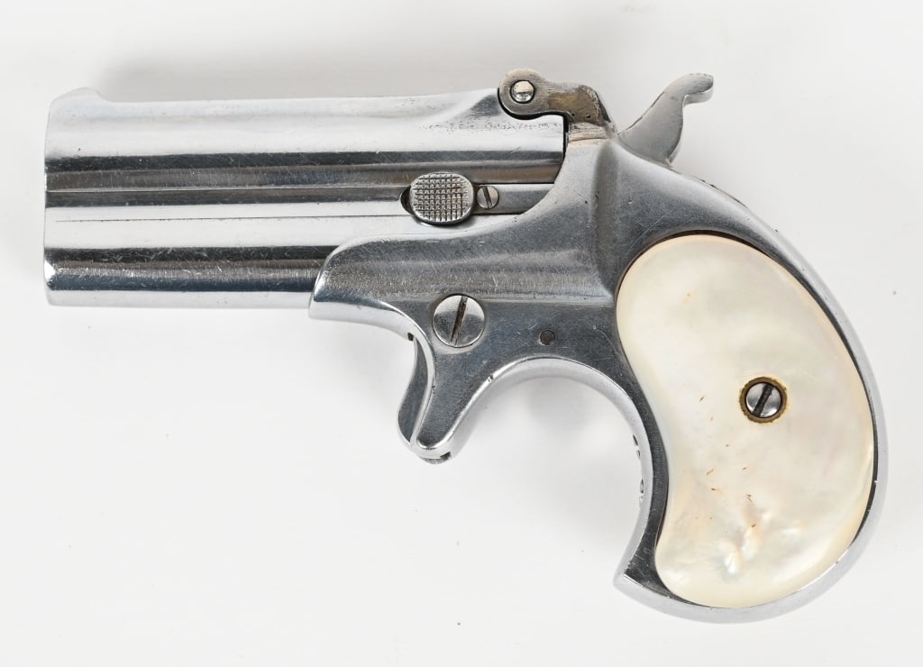 REMINGTON MODEL 95 TYPE III NICKLED DERRINGER: Serial #618. This is a type three Model number 4 made from 1912-1935. It is an over under top hinge derringer chambered for the .41 rim fire with 3" barrels. Condition: This gun retains 90% of the re-