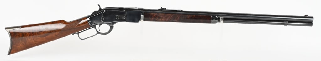 WINCHESTER 2ND MODEL 1873 RIFLE CALIBER 44-40: SERIAL NUMBER 89904 BARREL 24" CALIBER 44-40 WCF MANUFACTURED 1882. Manufactured with round barrel with 2 line Winchester New Haven barrel address. Blue finished with high figured varnished checkered 