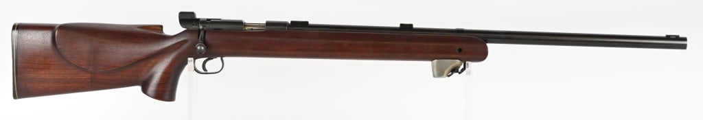 WINCHESTER MODEL 52B BOLT ACTION RIFLE: SERIAL NUMBER: 54278B. BARREL: 28". CALIBER: .22LR. MANUFACTURED: 1946. Standard markings and Winchester proofs. Single shot adapter in place. Heavy target barrel, with scope and sight blocks attached