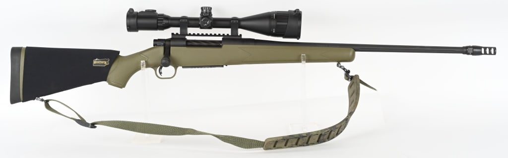 MOSSBERG PATRIOT BOLT ACTION RIFLE .300 WIN MAG: SERIAL NUMBER: MPR057089. BARREL: 22". CALIBER: .300 WIN MAG. MANUFACTURED: 2010S. Night Train edition, with factory fluted barrel, with ported muzzle break. Matte phosphate finish. Green polymer stoc