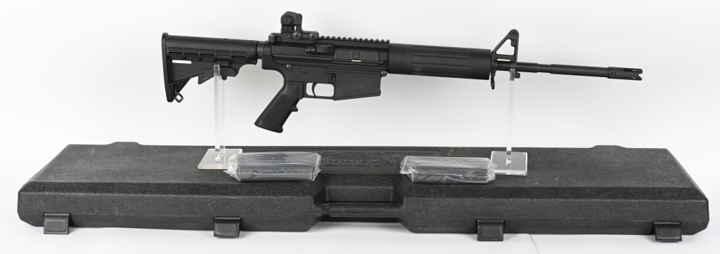 DPMS LR-308 7.62X51 CARBINE WITH CASE: SERIAL NUMBER: 24389. BARREL: 16-1/2". CALIBER: 7.62X51MM. MANUFACTURED: 2010S. Factory M4 profile barrel with ported muzzle break. Standard gas block with bayonet lug. Flat top upper with adjustable
