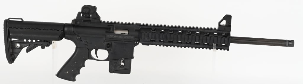SMITH & WESSON PERFORMANCE CENTER M&P 15-22 .22LR: SERIAL NUMBER: DYX7755. BARREL: 18-1/4". CALIBER: .22LR. MANUFACTURED: 2010S. Factory fluted barrel, with threaded muzzle. Flat top upper, with removable factory iron sights. Black polymer upper and l