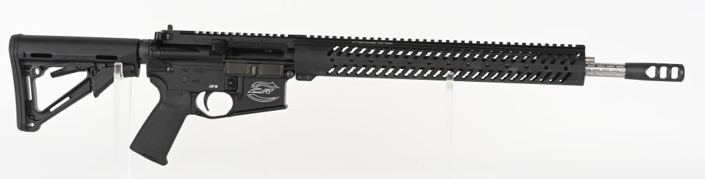 COLT COMPETITION SEMI AUTO RIFLE IN .223 REM: SERIAL NUMBER: CCR004956. BARREL: 18". CALIBER: .223 REM. MANUFACTURED: 2010S. Factory barrel with a "1/8" twist rate. Ported muzzle break. Low profile gas block with flat top rail system and upper. B