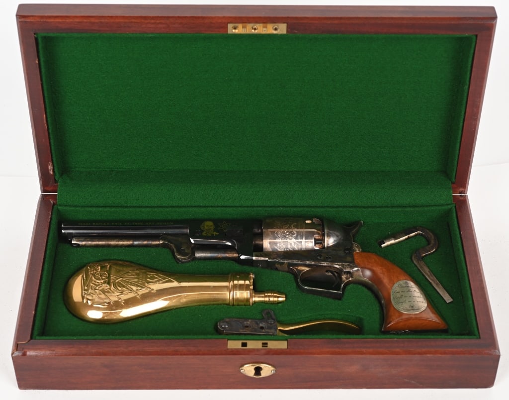 CASED TEXAS RANGER COLT 2ND MODEL DRAGOON: SERIAL 167. BARREL 7.5". CALIBER .44. Made by Uberti. High polish blue barrel with gold stamped "TEXAS RANGER HALL OF FAME & MUSEUM" Barrel flats have gold images and facsimile autographs of Sam Colt 