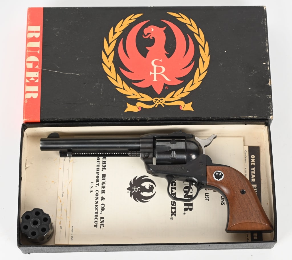 RUGER .22 SINGLE-SIX MAGNUM REVOLVER W/BOX: SERIAL NUMBER: 463075. BARREL: 5-1/2". CALIBER: .22 MAG/.22LR. MANUFACTURED: 1966. 3-screw gun that was sent to the factory, and a transfer bar was added. Blade front sight and fixed u-notch rear. Fac