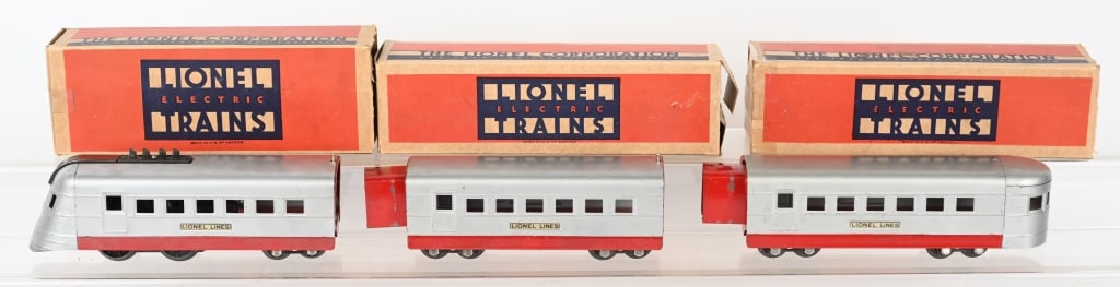LIONEL 1700E ENGINE & 2 CARS w/ BOXES: Includes 1700E engine, and cars 1701 and 1702. All with boxes. Excellent