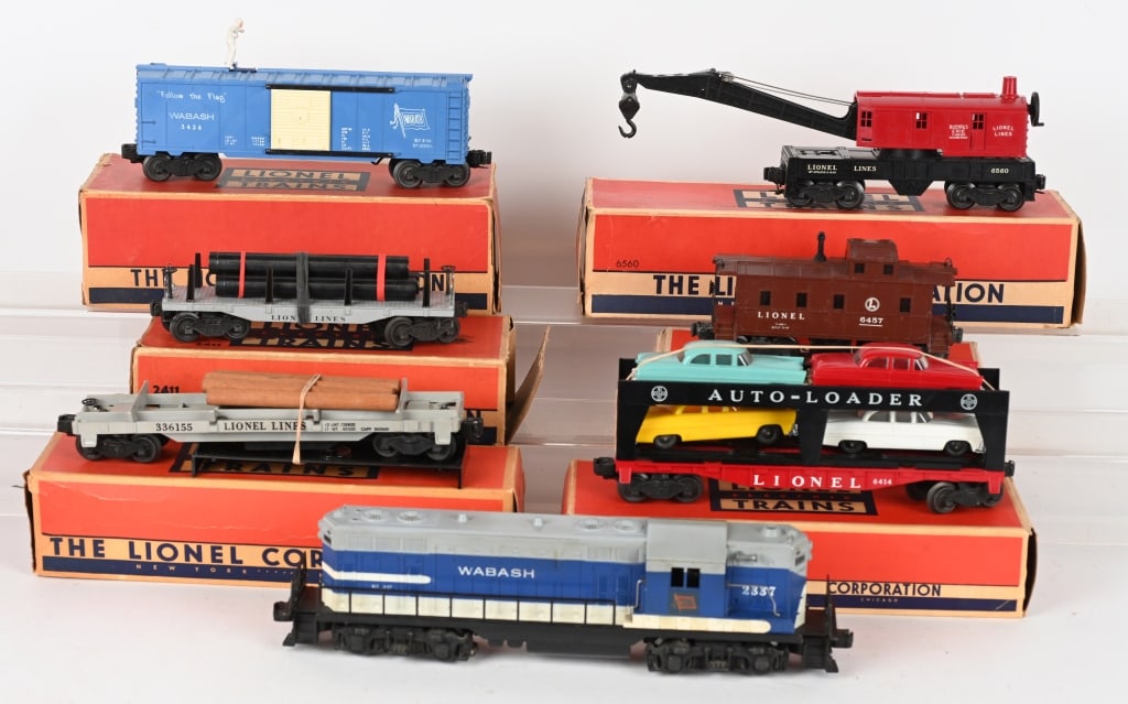 LIONEL 2337 DIESEL, & 6 CARS w/ BOXES: includes 2337 Wabash Diesel, and cars Nos: 3361, 3424, 6414, 2411, 6560 and 6457. All boxed except for 2337. Excellent