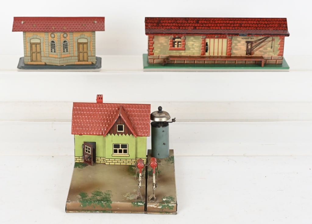 KARL BUB & BING GERMANY TRAIN ACCESSORIES LOT: Includes 1. House with water tank and crossing gate, 2. Small Station Building, and 3. Bing Freight Station Building. Largest is 11". Very Good