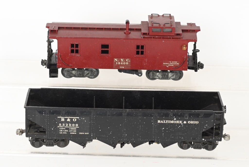 2- LIONEL SCALE FREIGHT CARS: includes Lionel scale Caboose 717K, along with scale Hopper 716. Excellent