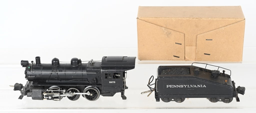 LIONEL 227 SWITCHER & 2227B TENDER, No. 8976: Lionel 227 Switcher locomotive and 2227B bell ringer tender. No. 8976. Both are Excellent