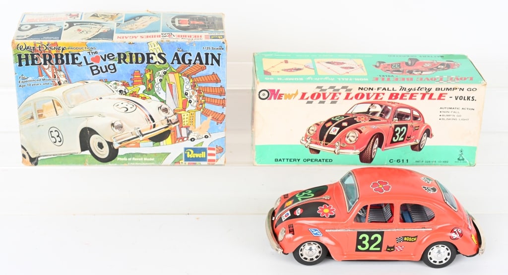 JAPAN VW BEETLE & REVELL HERBIE KIT w/ BOXES: The battery operated Love Love Beetle worked when tested. The Model kit is unbuilt. Both with boxes. Largest is 10" Excellent
