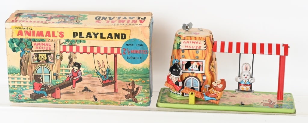 TPS JAPAN TIN WINDUP ANIMAL PLAYLAND w/ BOX: Scarce TPS Toy. All original and complete. Has great colors and graphics. Windup works. Comes with Box that had some repairs. 10" Excellent