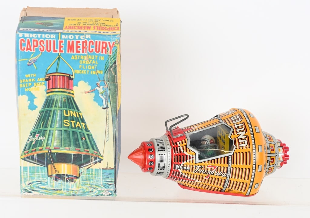 SH JAPAN TIN FRICTION MERCURY CAPSULE w/ BOX: All original with nice colors. Friction motor not working well. There is a tear is plastic window. Colorful original box has tape. 9" Excellent