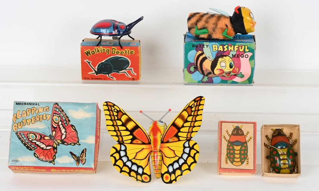 4- MECHANICAL TOYS w/ BOXES: The 3 windup toys worked when tested. The Bee is missing the key. The string pull small German Beetle is not working. Largest is 6" Excellent