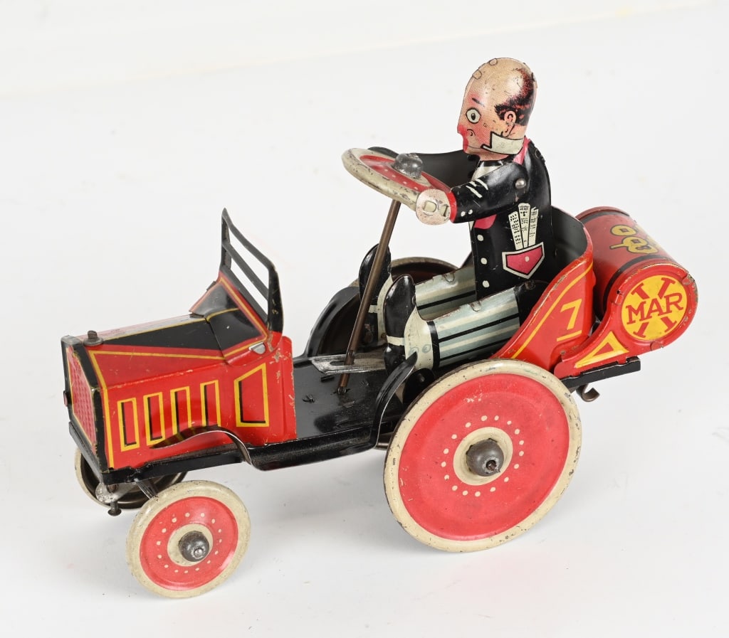 MARX TIN WINDUP COO COO CAR: Marx tin windup Coo Coo Car. All original in great condition. Works. 8" Excellent