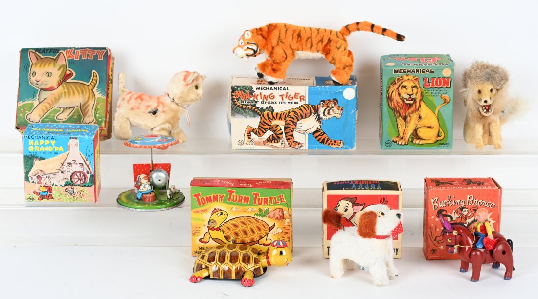 LOT OF ANIMAL TOYS w/ BOXES: Includes Tommy Turn Turtle, Playful Kitty, Toppy Frisky Puppy, Marx Walking Tiger, Bucking Broncho, and Happy Grandpa with Chickens. All in great shape. Boxed. Excellent