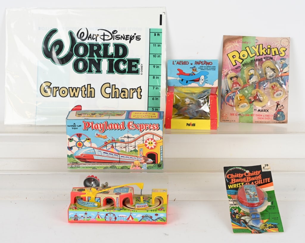 CHARACTER TOY LOT: Includes Polistil Donald Duck Airplane with Box, Disney World on Ice Growth Chart, Disney Rolykins on Card, Japan Playland Express with Box, and Chitty Chitty Bang Bang Watch on Card. Excellent