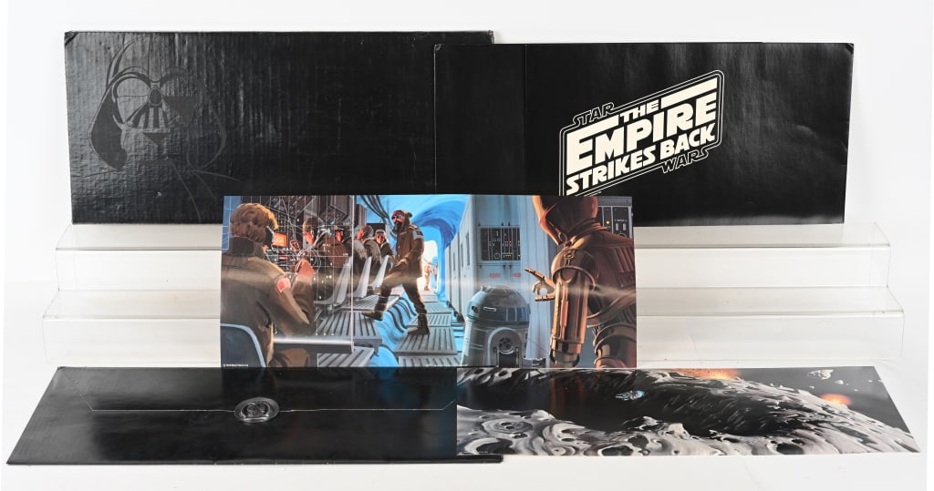 STAR WARS ESB RALPH McQUARRIE PORTFOLIO: Star Wars Empire Strikes Back Ralph McQuarrie Artist Print Portfolio. Still in package with metal Darth Vader Helmet. 23 1/2 x 10 1/2" Excellent
