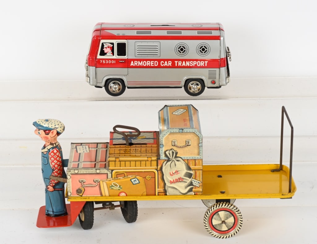 UNIQUE ART BAGGAGE CART & JAPAN ARMORED CAR BANK: Includes Unique Art tin windup Baggage Cart all original and work. Plus Japan tin friction Armored Car Transport Bank all original and works. Largest 13" Excellent
