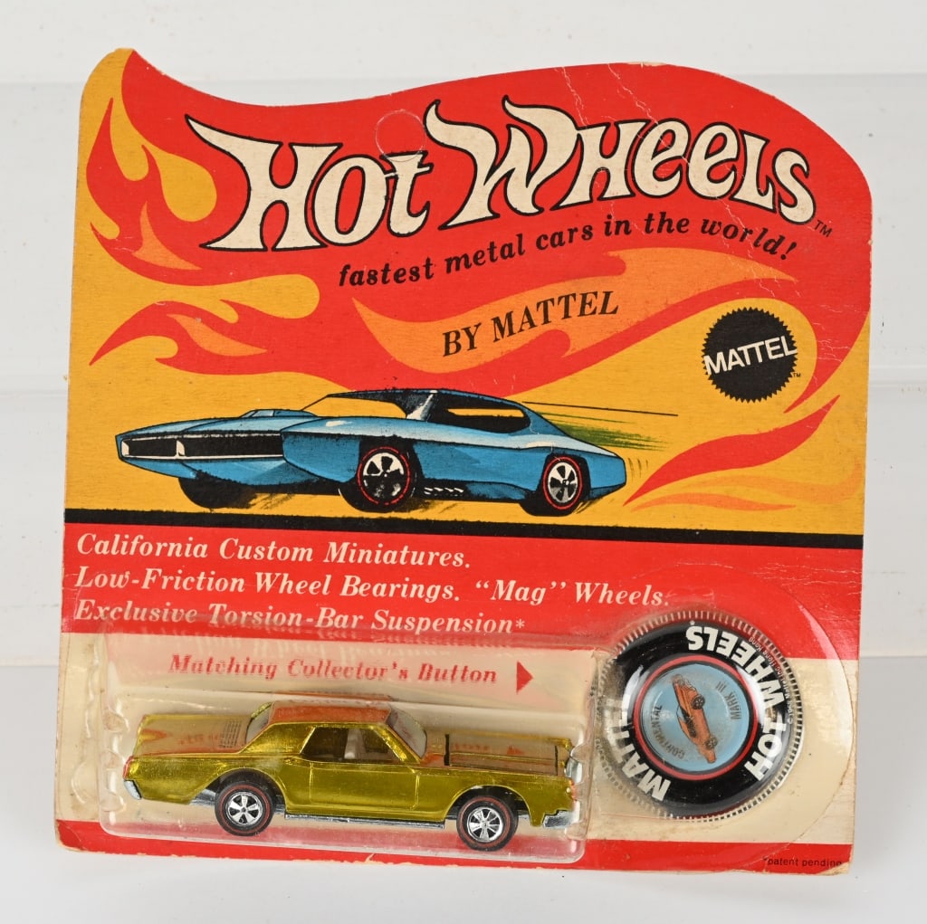1969 HOT WHEELS REDLINE CONTINENTAL MARK MOC: 1969 Hot Wheels Redline Continental Mark III. Yellow in color. Minty sealed on blister pack with button.