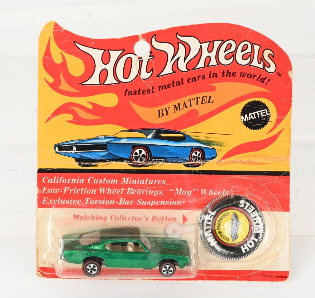 1969 HOT WHEELS REDLINE CUSTOM BARRACUDA MOC: 1969 Hot Wheels Redline Custom Barracuda. Green in color with White Interior. Minty sealed on blister pack with button. Card creased