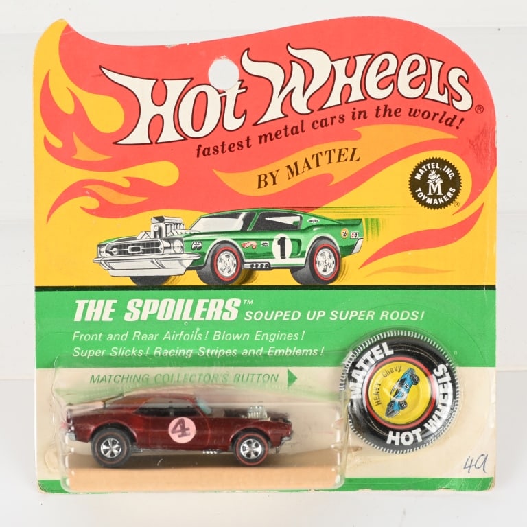 1967 HOT WHEELS REDLINE HEAVY CHEVY MOC: 1967 Hot Wheels Redline Heavy Chevy. Brown in color. Minty sealed on blister pack with button. Small crack in bubble