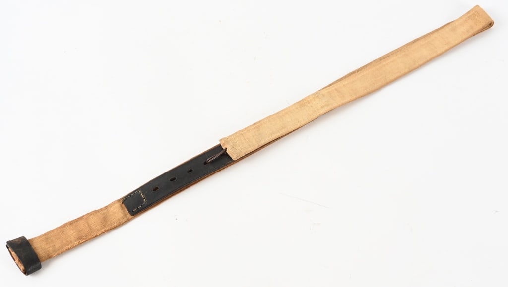 CIVIL WAR CONFEDERATE CANVAS & LEATHER RIFLE SLING: Painted canvas Confederate accoutrements supplied by firms in Columbus, Georgia, are well documented. They were a practical and both time and cost-saving alternative to leather gear. This is a very go