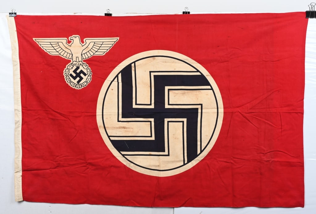 WWII NAZI GERMAN STATE SERVICE FLAG 34X53 WW2: A 1935 pattern double sided, printed cotton/linen construction flag. The flag features a red base field white with a white central, circular field with a black and white bordered black static swastika