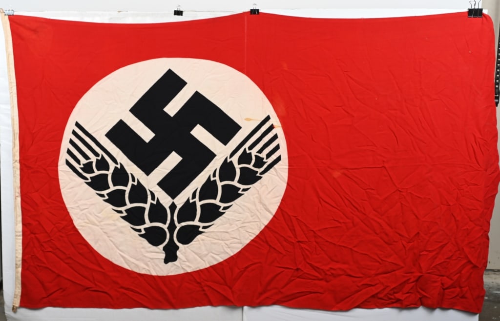 WWII NAZI GERMAN RAD FLAG REICHSARBEITSDIENST WW2: A double sided, printed, red flag measuring approximately 46 X 78. The flag is unmarked and is in very good condition. Original bunting rope is present. Excellent. The Reich Labour Service (Reichsarbe