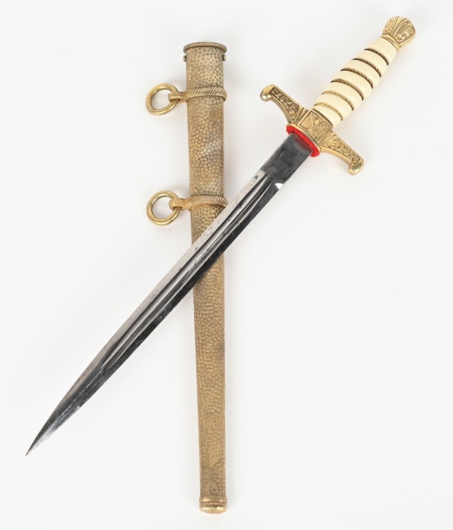 WWII NAZI GERMAN KRIEGSMARINE ASSAULT DAGGER PUMA: Rare Navy Assault Dagger by Puma in outstanding condition. Late Puma, Solingen trademark portraying a diamond around a puma’s profile. Overall, the dagger shows light surface wear. Obverse cross