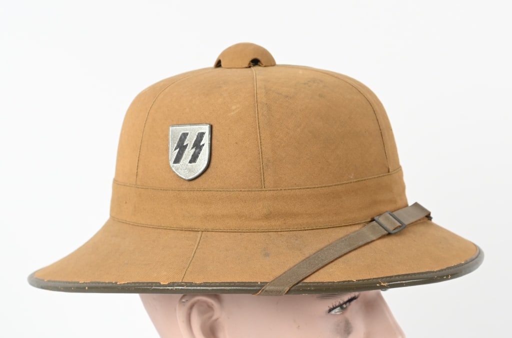 WWII NAZI GERMAN WAFFEN SS TROPICAL PITH HELMET: Original WWII German Waffen SS FIRST PATTERN TROPICAL PITH HELMET. (Tropenhelm) In late 1940, with the impending German entrance into the North African campaign, tropical uniforms, headgear and equipm