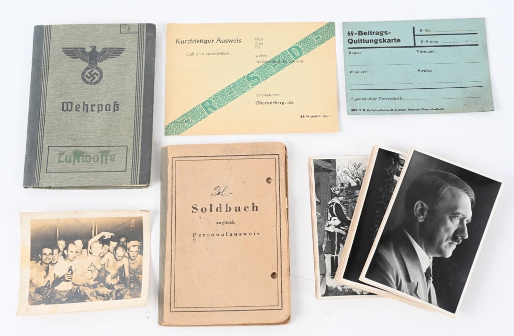 WWII NAZI GERMAN WAFFE SS PAPER ITEMS LUFTWAFFE: Lot of Nazi German ephemera to include 1) SS Police Members Soldbuch Nicely filled out and the name of the soldier was Rudolf Meyer with a black and white photo of the soldier in uniform. 2) SS B