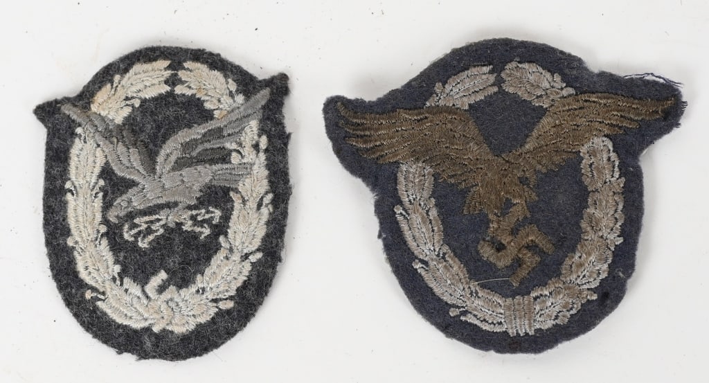WWII NAZI GERMAN LUFTWAFFE CLOTH BADGE LOT WW2: Lot of WWII Nazi German Luftwaffe badges to include 1) PADDED EM/NCO'S PILOT'S BADGE IN CLOTH. The machine embroidered badge is in the form of a pale silver/gray, vertically oval wreath, with laurel l