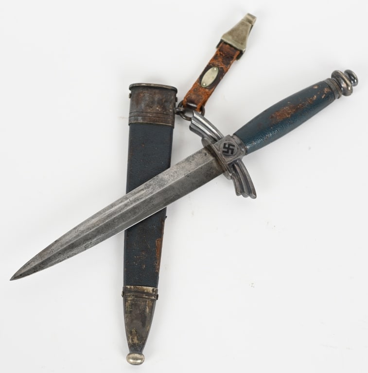 WWII NAZI GERMAN DLV GLIDER PILOT'S KNIFE / DAGGER: DLV glider pilot’s dagger. The 17cm long silver/nickel plated blade is in nice condition with some minor spotting the expected scabbard wear. Maker marked "GEBR. HELLER MARIENTHAL b.SCHWEINA/THR