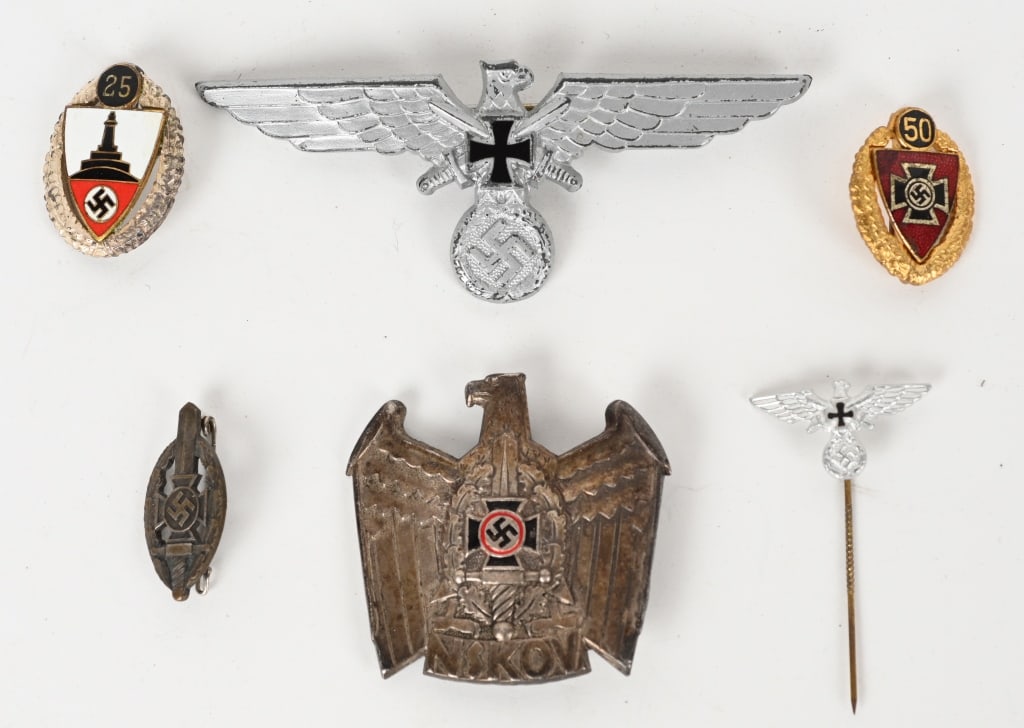 WWII NAZI NSKOV NS-RKB MEMBERSHIP BADGE LOT WW2: WWII Nazi German lot to include 1) NSKOV VISOR CAP EAGLE. A stamped alloy visor cap badge, approximately 50mm square, in the form of a stylized eagle with down-swept wings, clutch
