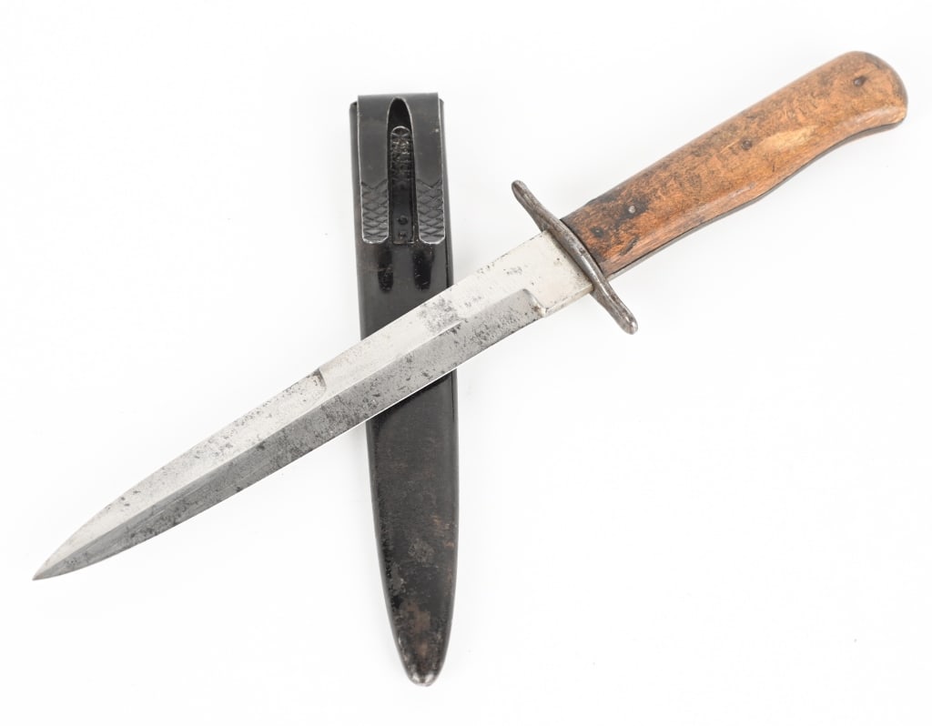 WWII NAZI GERMAN CLOSE COMBAT TRENCH BOOT KNIFE: The knife features a roughly, 15cm long, drop forged steel construction, non-fullered, blade with a long top swedge and a full length, including the hilt, of roughly, 27cm marked S indicating Police u