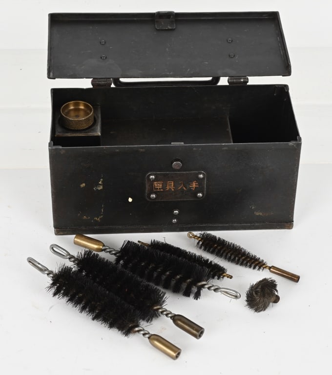 WWII JAPANESE GUN / 20MM CANNON CLEANING KIT WW2: WWII Japanese metal gun cleaning kit with oiler. The steel outer box measures 8 1/2 X 4 X 3 1/2 inches having a large oiler with many brushes that appear to be a 20mm cannon. Excellent.