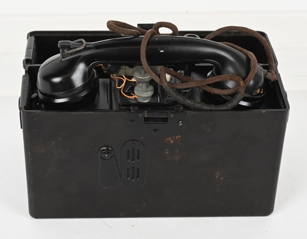 WWII NAZI GERMAN F33 FIELD TELEPHONE COMPLETE WW2: WWII Nazi German 1942 dated, Bakelite field telephone. Phone is complete with a hand crank. Excellent. Accurate intelligence and secure lines of communication are crucial elements to all armies i