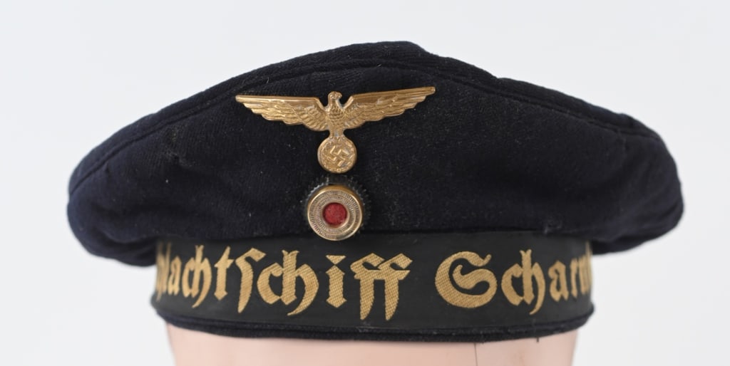WWII NAZI GERMAN KRIEGSMARINE DONALD DUCK HAT WW2: Private purchase, deep navy blue doeskin wool construction "Donald Duck" style sailor’s cap features a non-removable, one piece, circular crown and two piece side panels with machine stitched ve