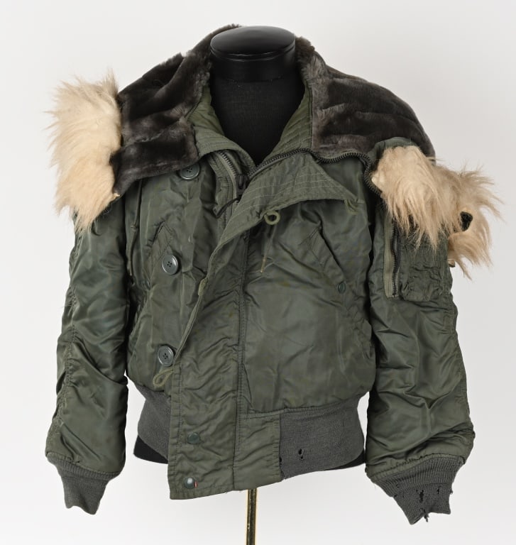 WWII KOREAN WAR VIETNAM FLIGHT CLOTHING LOT WW2: Aviation related clothing lot to include N-2B Flight Parka size small, Mechanics Parka having several small holes, N-2B Flight Parka size Medium, Type A-4 Flight Suit size 38, HBT Cover